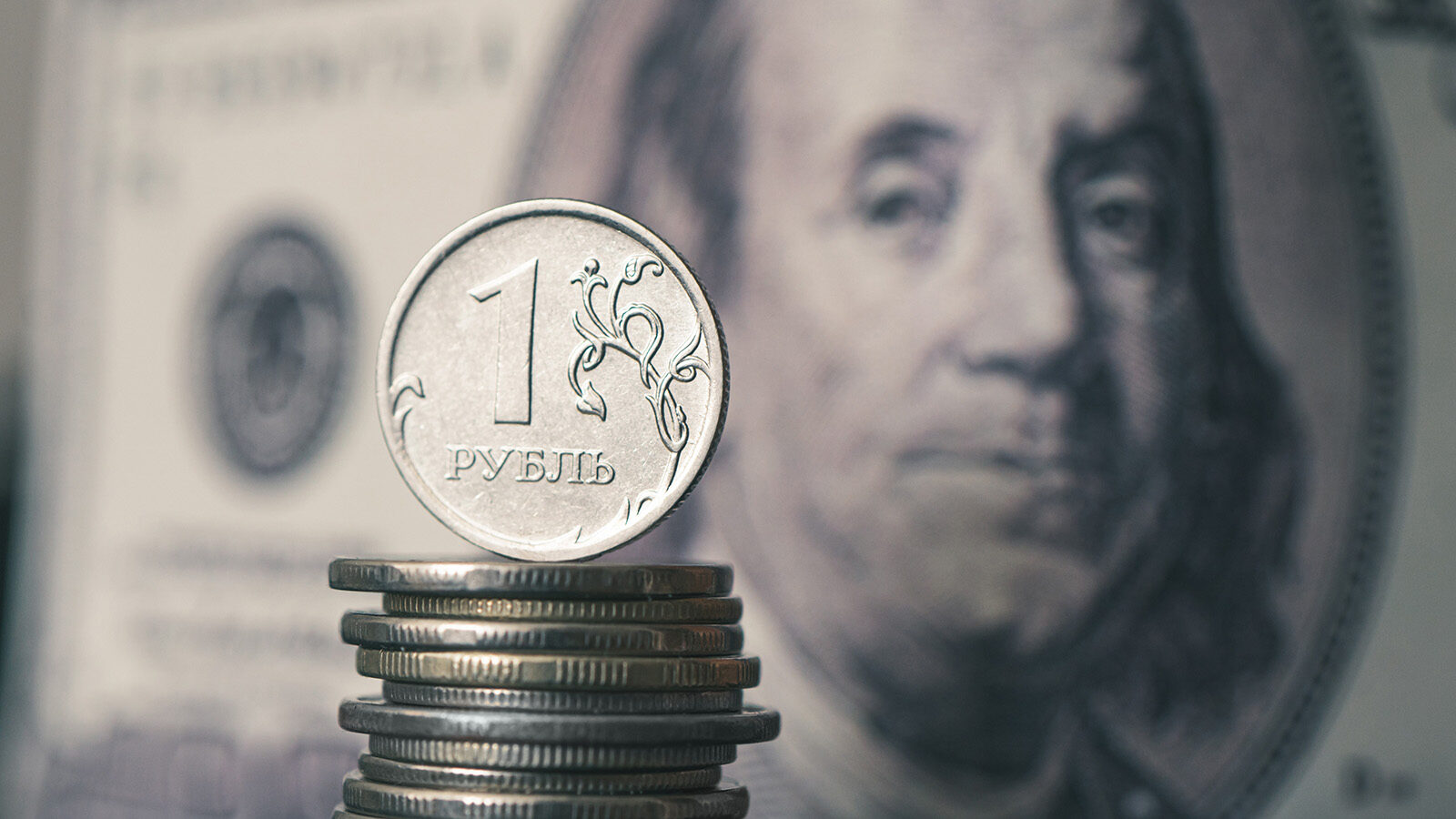 american-dollar-and-russian-ruble-close-up-concept-of-falling-and-growth-of-exchange-rates-fall-of-russian-currency-currency-exchange-at-the-bank-sharp-drop-ruble-s